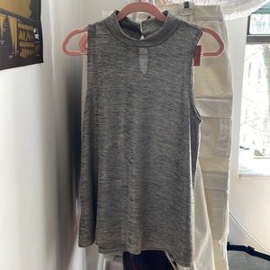 Semi sheer sleeveless turtleneck